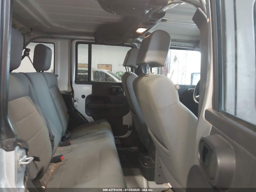 2009 Jeep Wrangler Unlimited Sahara VIN: 1J4GA59179L770285 Lot: 42791416