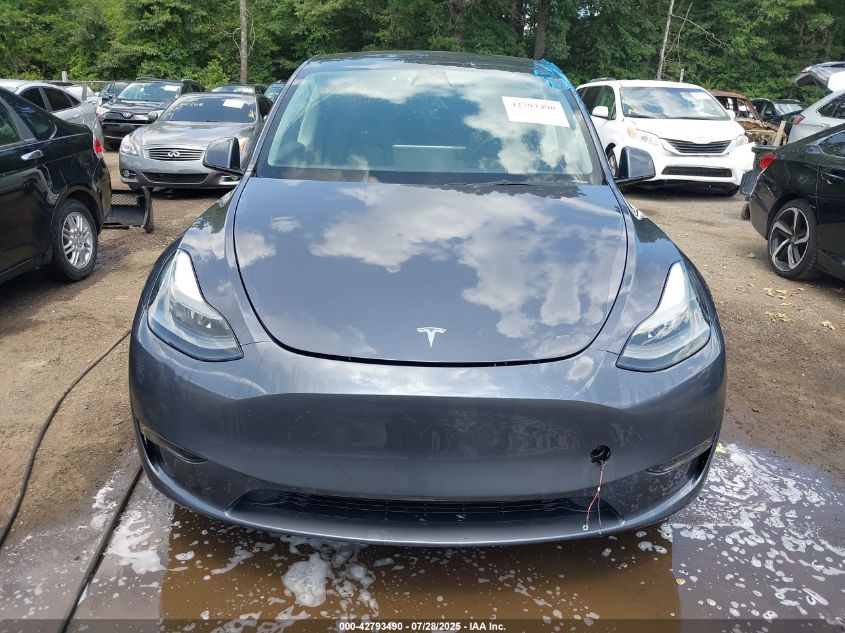 2023 Tesla Model Y Awd/Long Range Dual Motor All-Wheel Drive VIN: 7SAYGDEEXPF697167 Lot: 42793490
