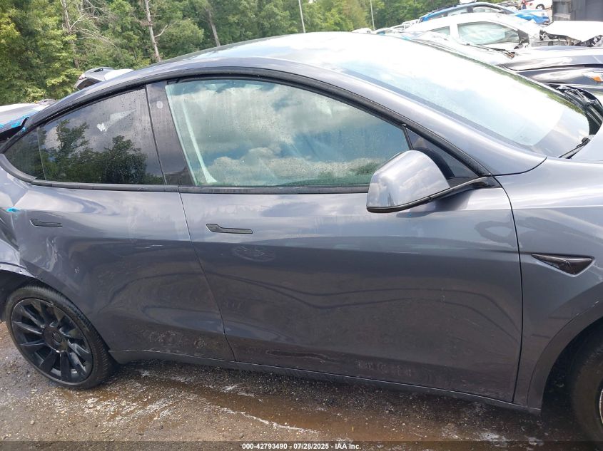 2023 Tesla Model Y Awd/Long Range Dual Motor All-Wheel Drive VIN: 7SAYGDEEXPF697167 Lot: 42793490