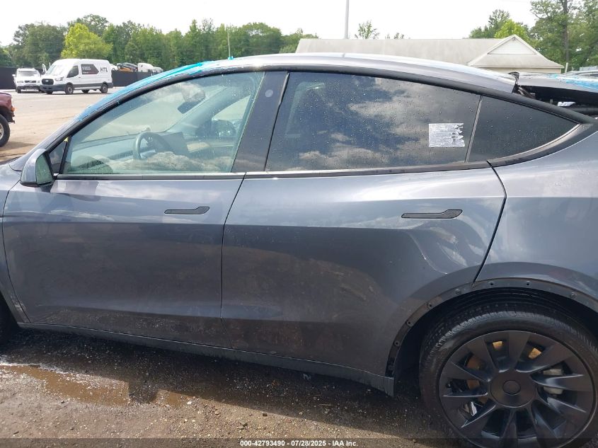 2023 Tesla Model Y Awd/Long Range Dual Motor All-Wheel Drive VIN: 7SAYGDEEXPF697167 Lot: 42793490