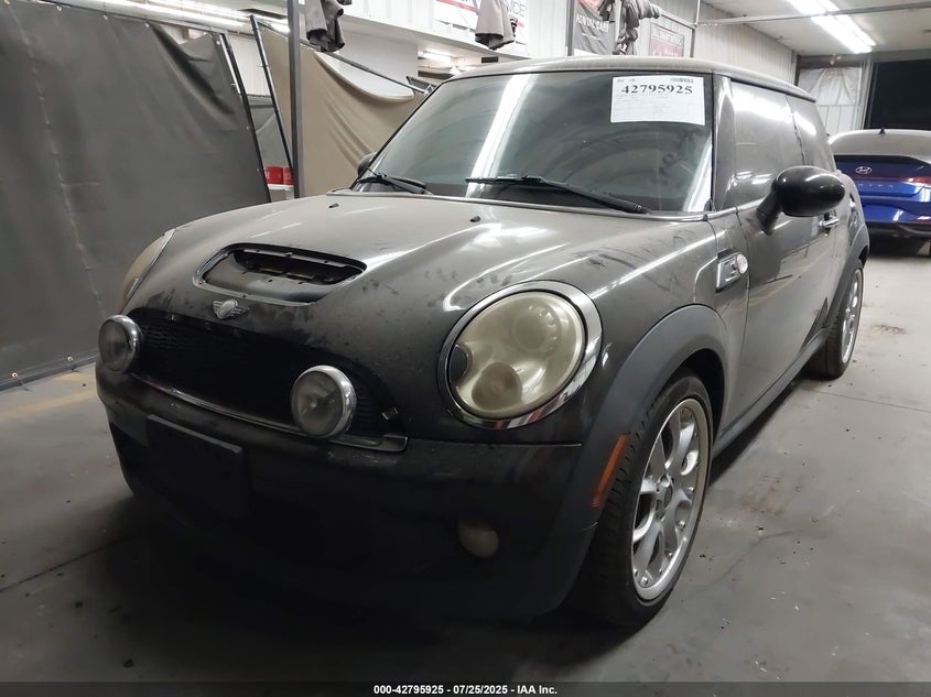 2010 Mini Cooper S VIN: WMWMF7C54ATZ34577 Lot: 42795925