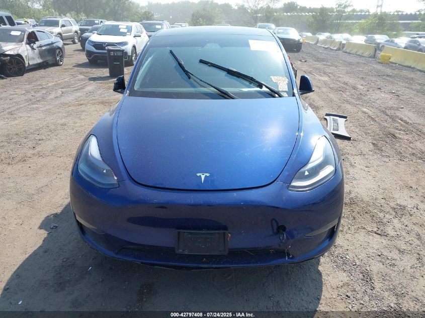 2023 Tesla Model Y VIN: 7SAYGDEE7PA172208 Lot: 42797408