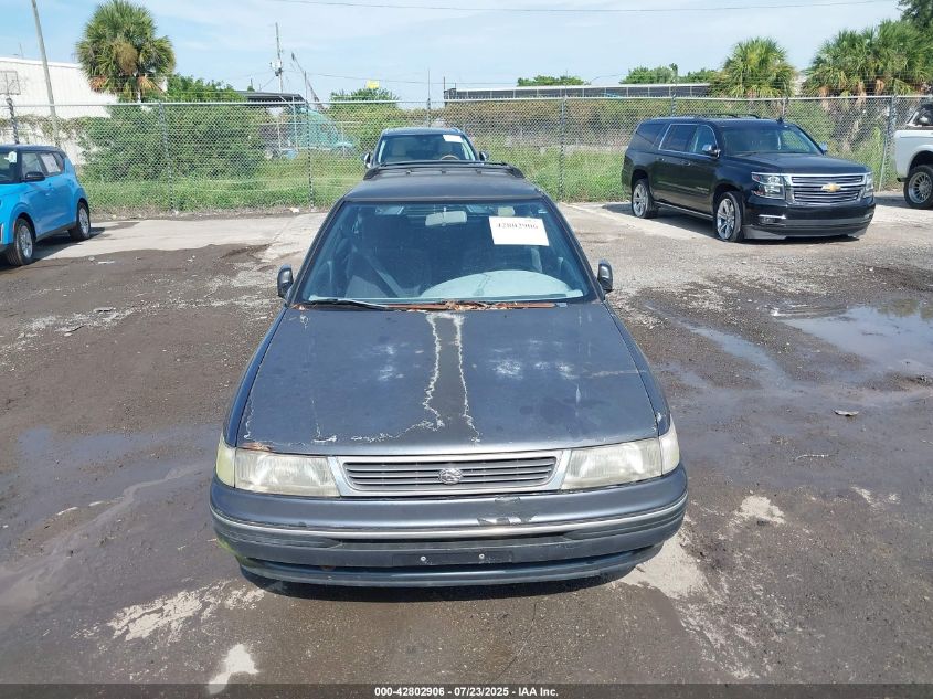 1992 Subaru Legacy L VIN: 4S3BJ6333N7912389 Lot: 42802906