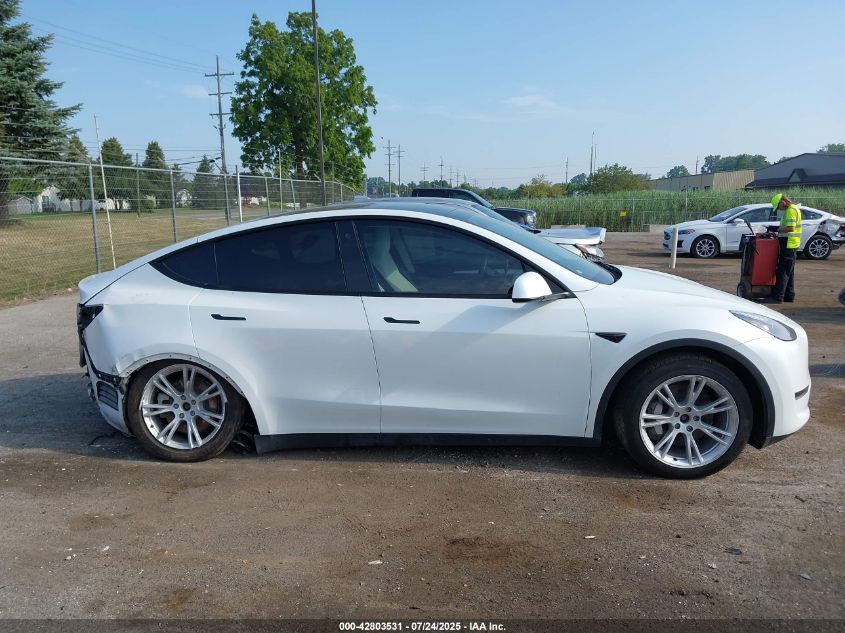2023 Tesla Model Y Awd/Long Range Dual Motor All-Wheel Drive VIN: 7SAYGDEE0PF674299 Lot: 42803531