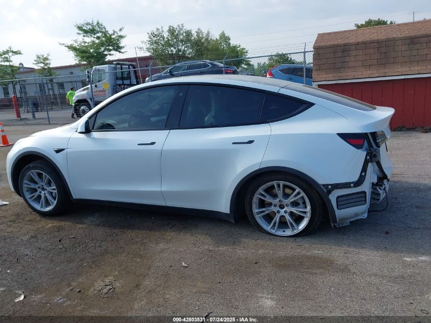 2023 Tesla Model Y Awd/Long Range Dual Motor All-Wheel Drive VIN: 7SAYGDEE0PF674299 Lot: 42803531