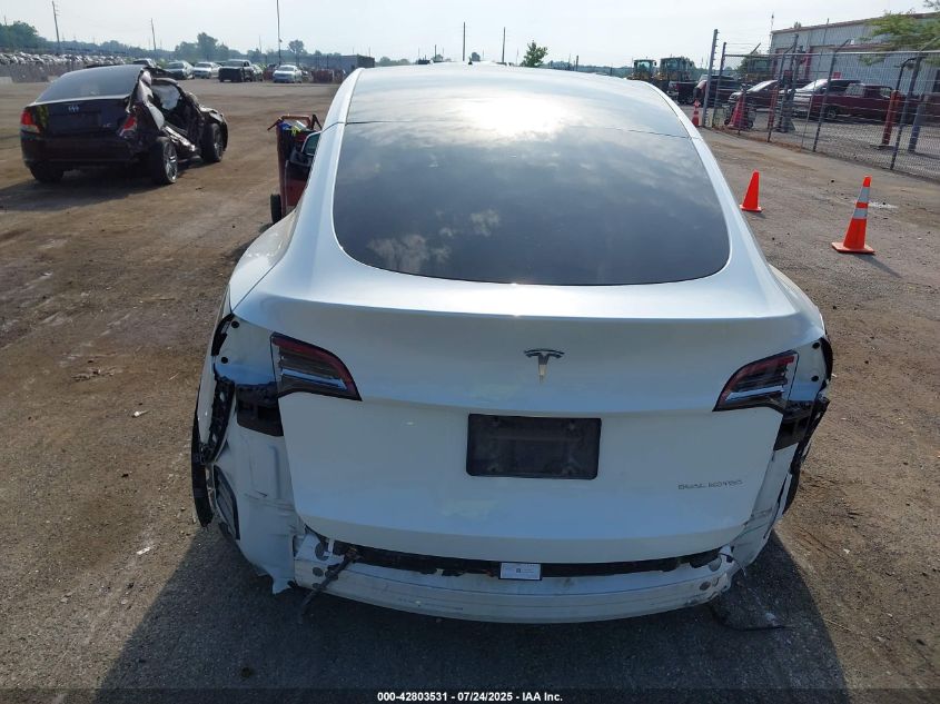 2023 Tesla Model Y Awd/Long Range Dual Motor All-Wheel Drive VIN: 7SAYGDEE0PF674299 Lot: 42803531