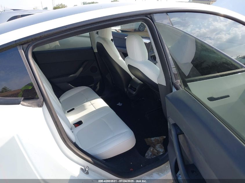 2023 Tesla Model Y Awd/Long Range Dual Motor All-Wheel Drive VIN: 7SAYGDEE0PF674299 Lot: 42803531