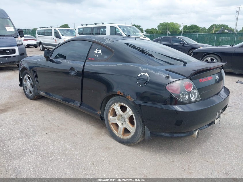 2003 Hyundai Tiburon Gt VIN: KMHHN65F63U072432 Lot: 42813911