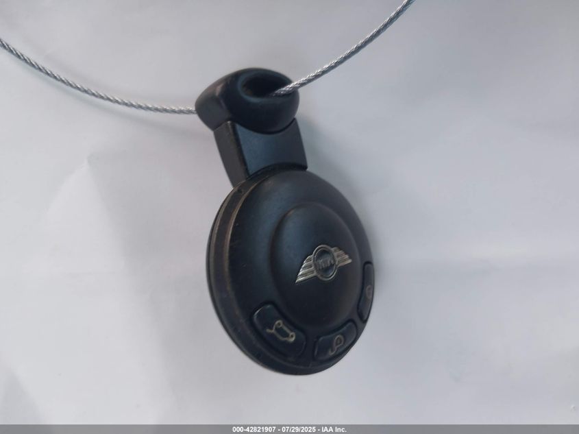 2009 Mini Cooper VIN: WMWMF33519TU71995 Lot: 42821907