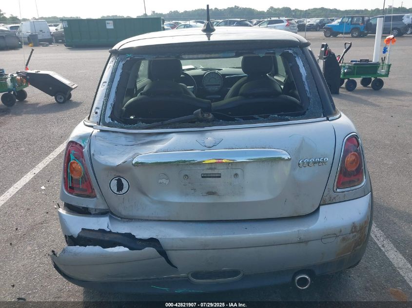 2009 Mini Cooper VIN: WMWMF33519TU71995 Lot: 42821907