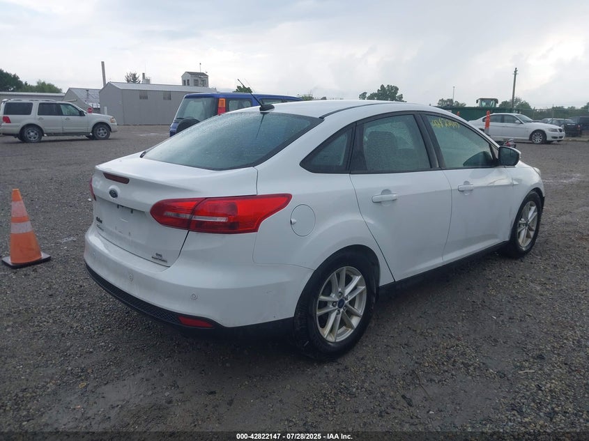 2016 FORD FOCUS SE - 1FADP3F21GL390662