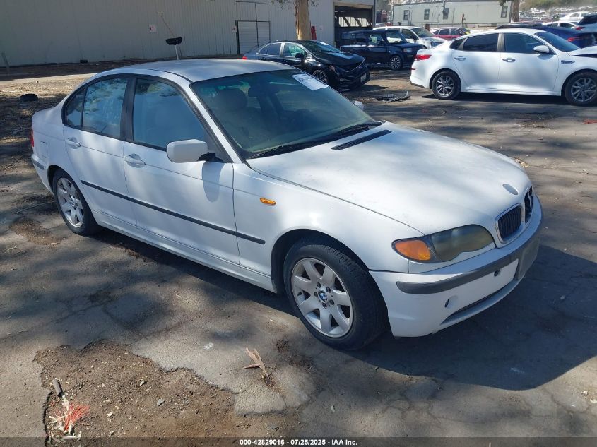 2002 BMW 325I white sedan gasoline WBAET37452NG70513 photo #1
