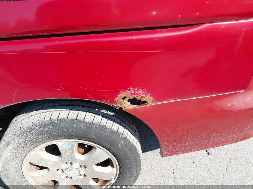 2002 Honda Odyssey Ex VIN: 2HKRL18602H561267 Lot: 42835580