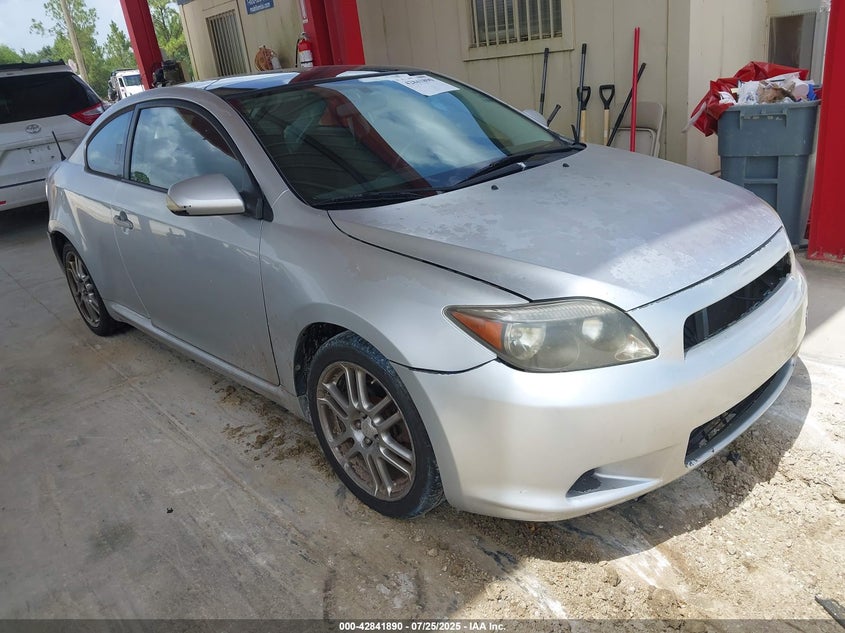 2009 Scion Tc silver coupe gasoline JTKDE167290287635 photo #1
