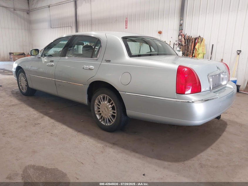 2007 Lincoln Town Car Signature Limited blue sedan flexible 1LNHM82V87Y609259 photo #4