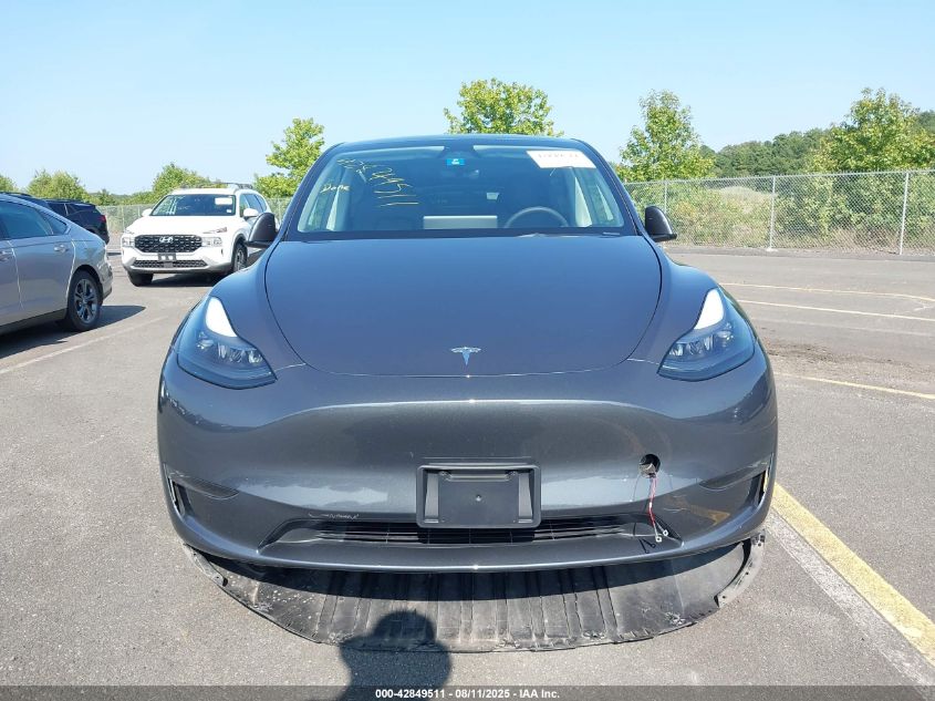 2023 Tesla Model Y Awd/Long Range Dual Motor All-Wheel Drive VIN: 7SAYGDEE9PF829917 Lot: 42849511