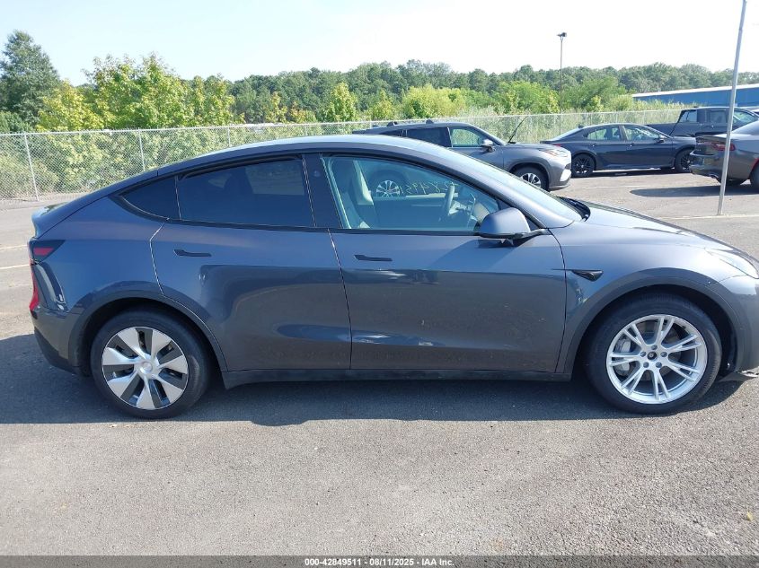 2023 Tesla Model Y Awd/Long Range Dual Motor All-Wheel Drive VIN: 7SAYGDEE9PF829917 Lot: 42849511
