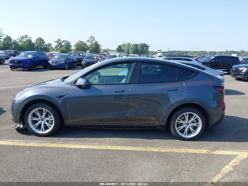2023 Tesla Model Y Awd/Long Range Dual Motor All-Wheel Drive VIN: 7SAYGDEE9PF829917 Lot: 42849511