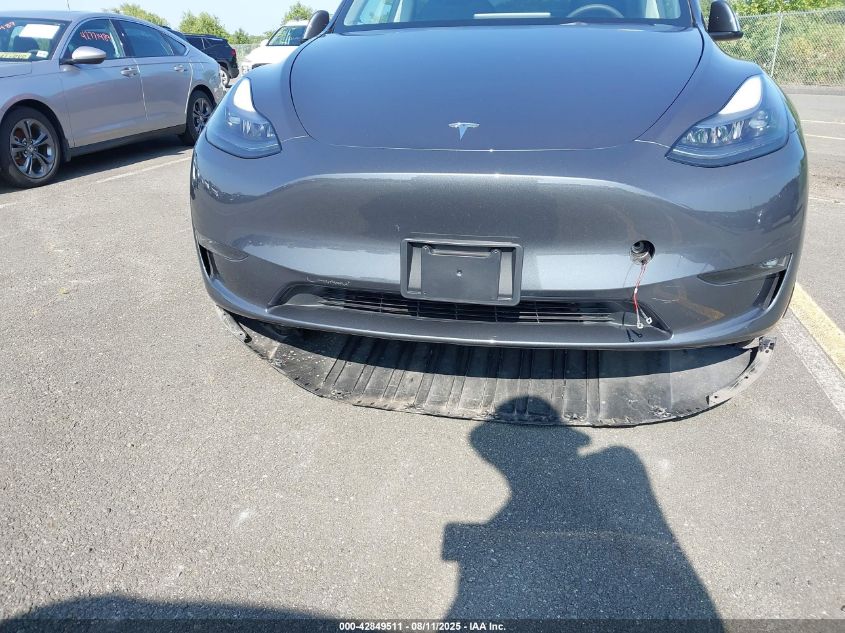 2023 Tesla Model Y Awd/Long Range Dual Motor All-Wheel Drive VIN: 7SAYGDEE9PF829917 Lot: 42849511