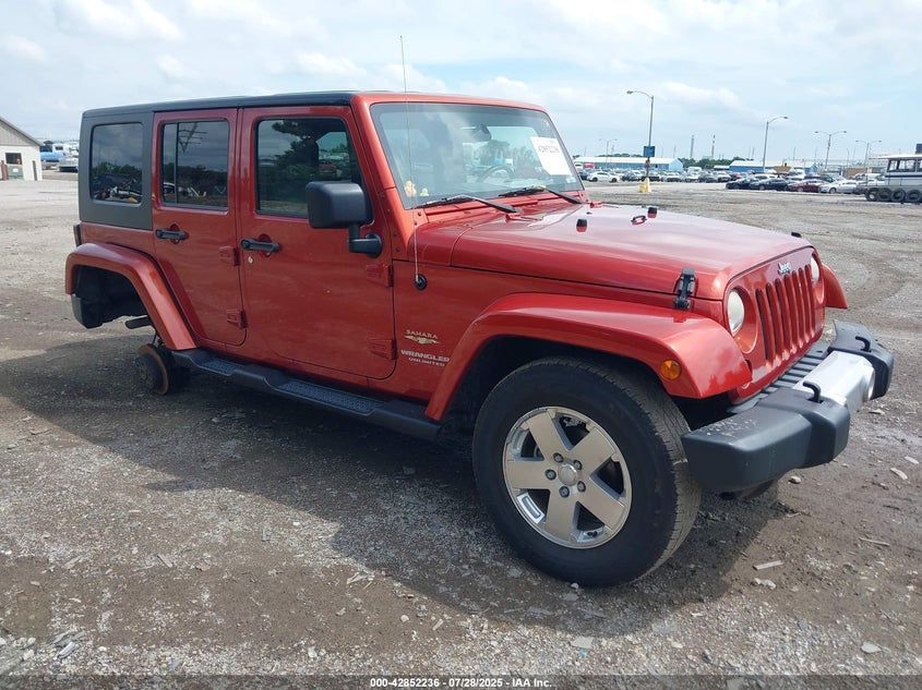 1J4GA59199L751267 2009 Jeep Wrangler Unlimited Sahara auction photo 1