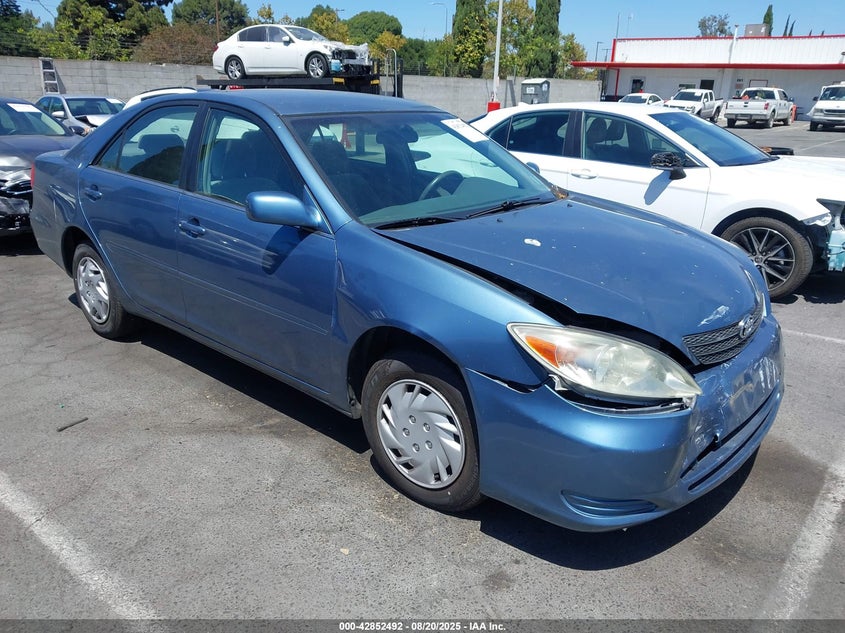 2003 Toyota Camry Le blue sedan gasoline 4T1BE30K13U706741 photo #1