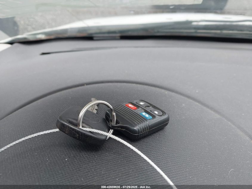 2002 Mercury Cougar V6 VIN: 1ZWFT61L125605219 Lot: 42859530