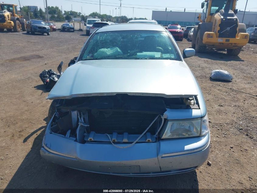 2004 Mercury Grand Marquis Gs VIN: 2MEFM74WX4X672773 Lot: 42866080