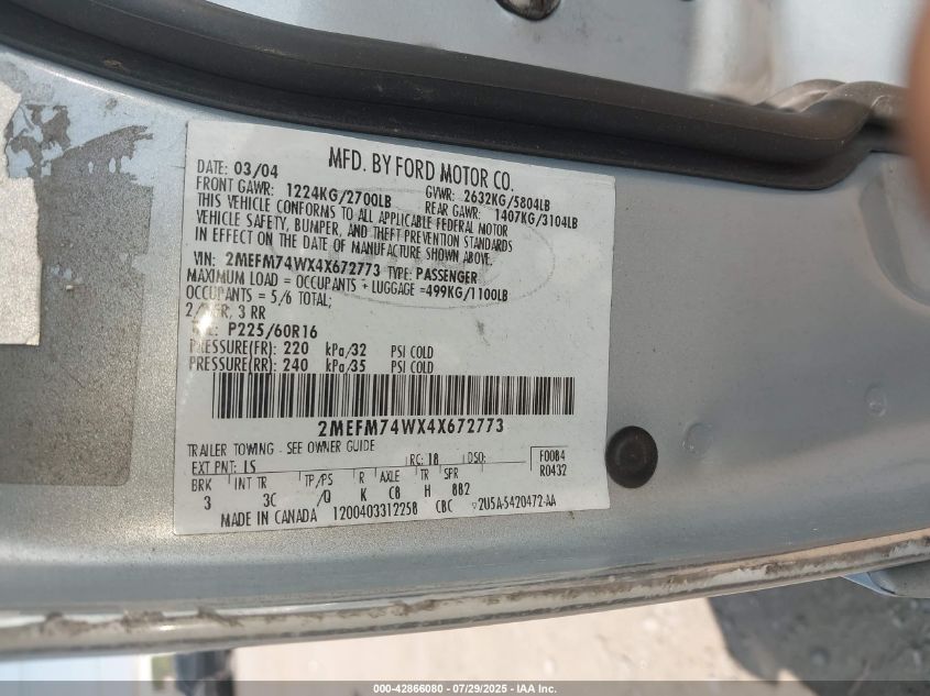 2004 Mercury Grand Marquis Gs VIN: 2MEFM74WX4X672773 Lot: 42866080