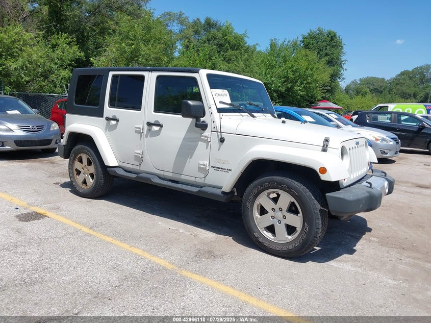 1J4HA5H19AL220208 2010 Jeep Wrangler Unlimited Sahara auction photo 1