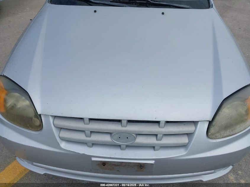 2003 Hyundai Accent VIN: KMHCF35C33U276858 Lot: 43223114