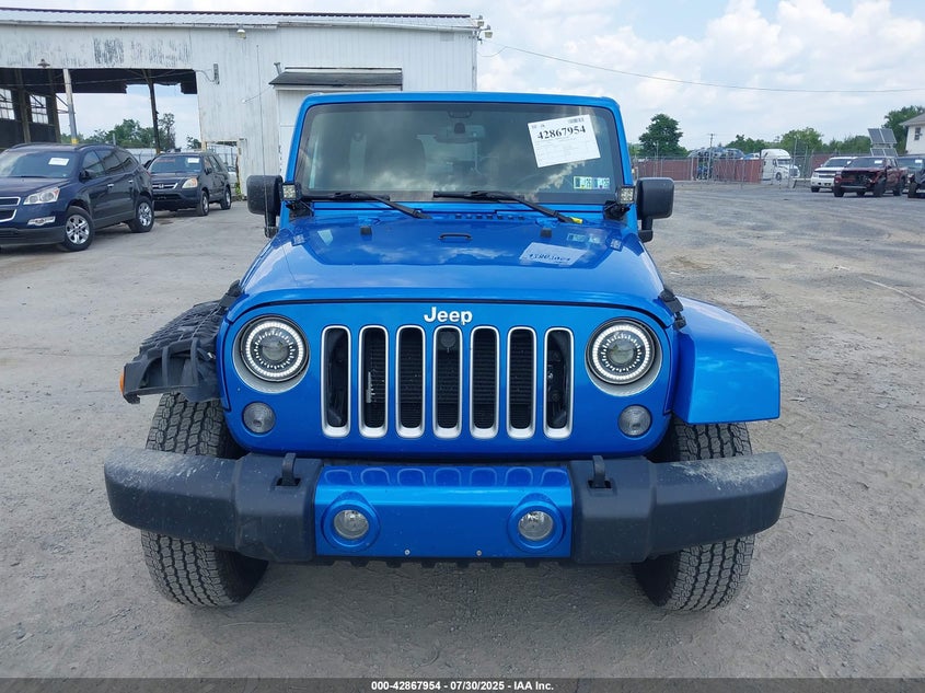 2016 JEEP WRANGLER UNLIMITED SAHARA - 1C4HJWEG4GL243991