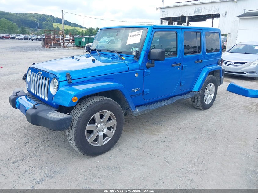 2016 JEEP WRANGLER UNLIMITED SAHARA - 1C4HJWEG4GL243991
