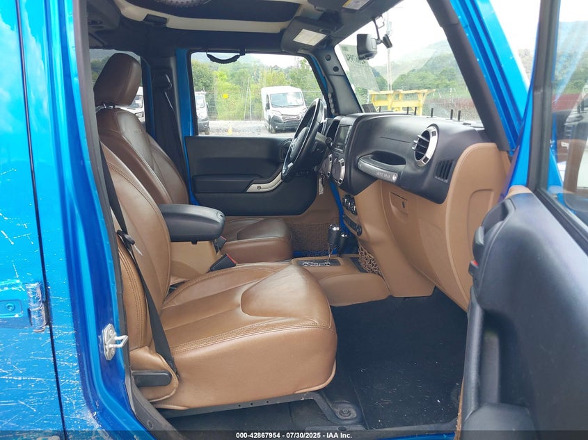 2016 JEEP WRANGLER UNLIMITED SAHARA - 1C4HJWEG4GL243991