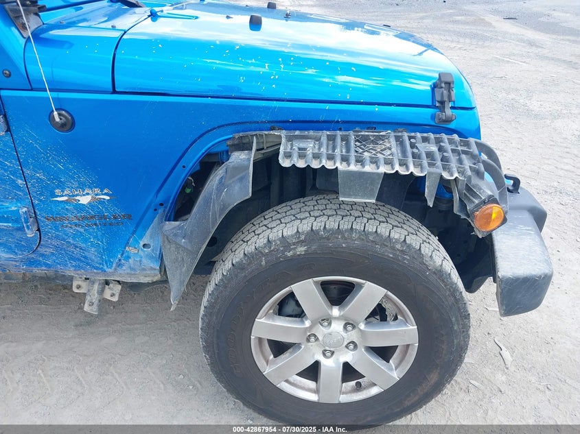 2016 JEEP WRANGLER UNLIMITED SAHARA - 1C4HJWEG4GL243991