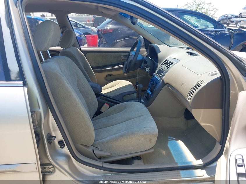 2001 Nissan Maxima Gxe VIN: JN1CA31D21T841656 Lot: 42876639