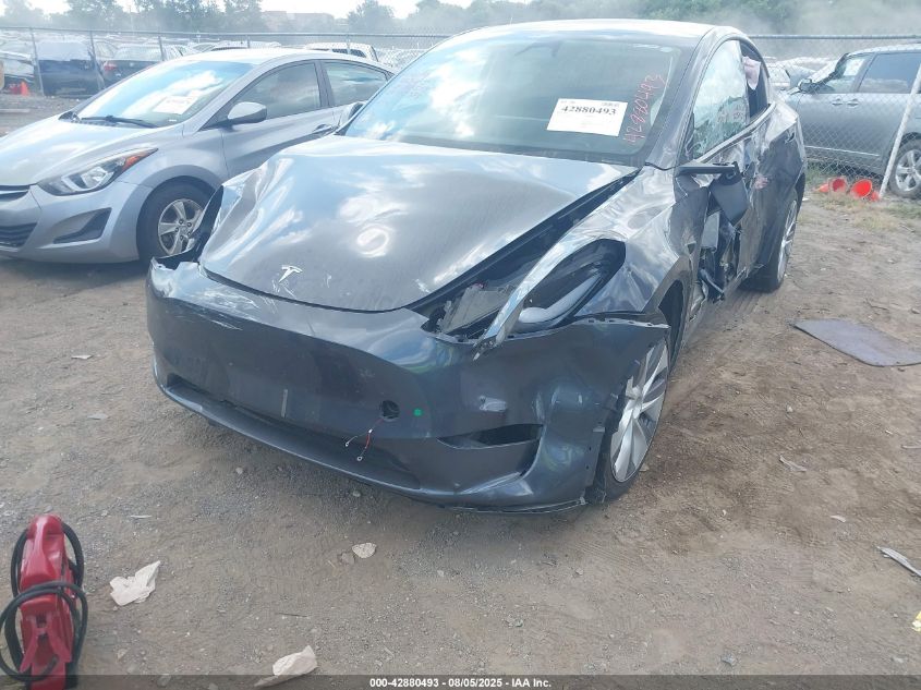 2023 Tesla Model Y Rwd VIN: 7SAYGDED6PF945373 Lot: 42880493