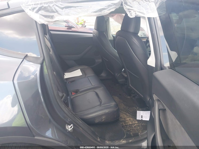 2023 Tesla Model Y Rwd VIN: 7SAYGDED6PF945373 Lot: 42880493