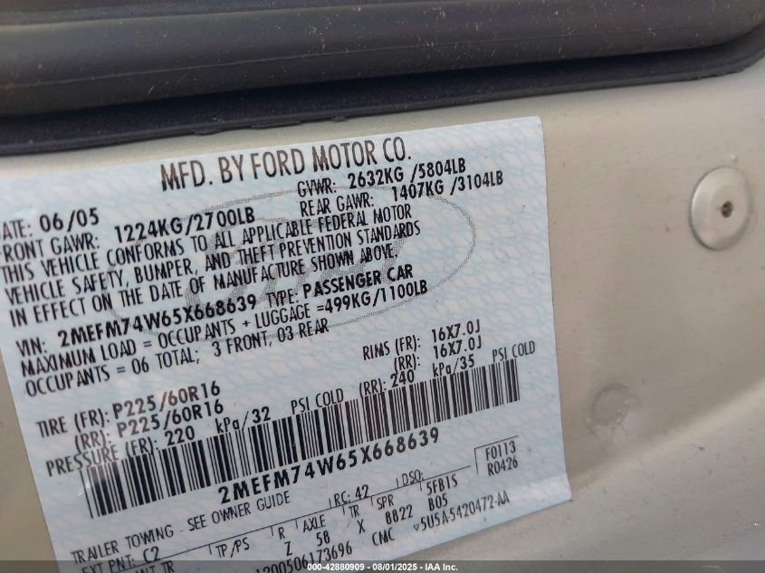 2005 Mercury Grand Marquis Gs VIN: 2MEFM74W65X668639 Lot: 42880909