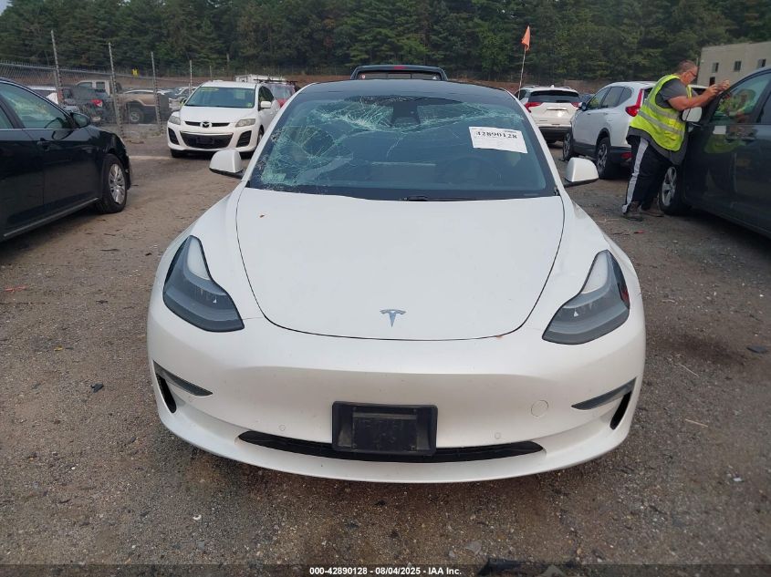 2021 Tesla Model 3 Standard Range Plus Rear-Wheel Drive VIN: 5YJ3E1EA4MF042717 Lot: 42890128