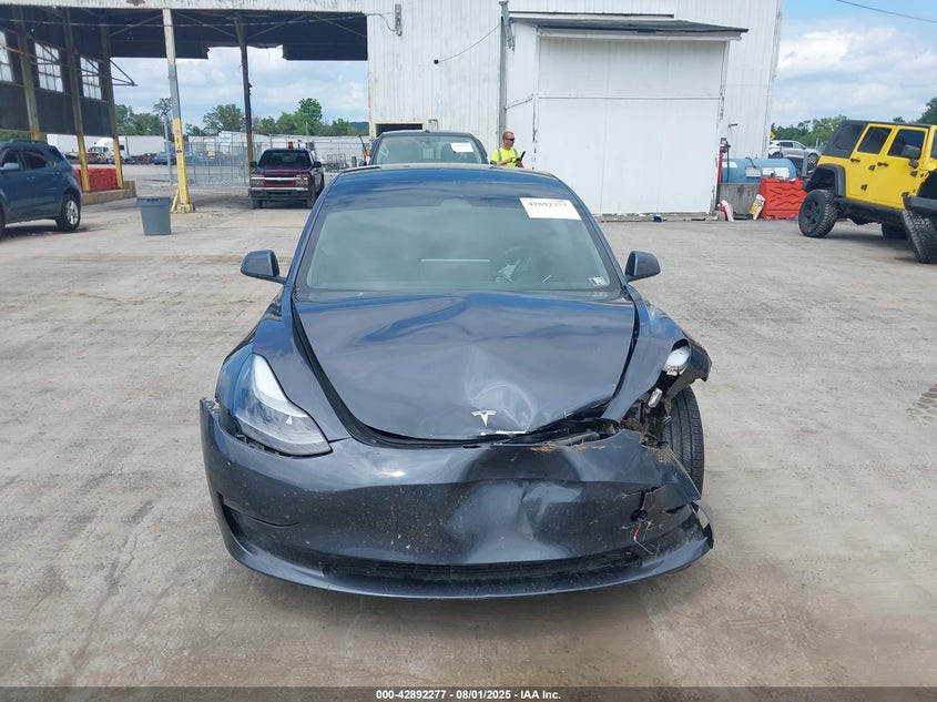 2023 Tesla Model 3 Long Range Dual Motor All-Wheel Drive VIN: 5YJ3E1EB3PF633554 Lot: 42892277