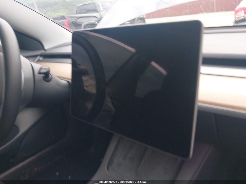 2023 Tesla Model 3 Long Range Dual Motor All-Wheel Drive VIN: 5YJ3E1EB3PF633554 Lot: 42892277