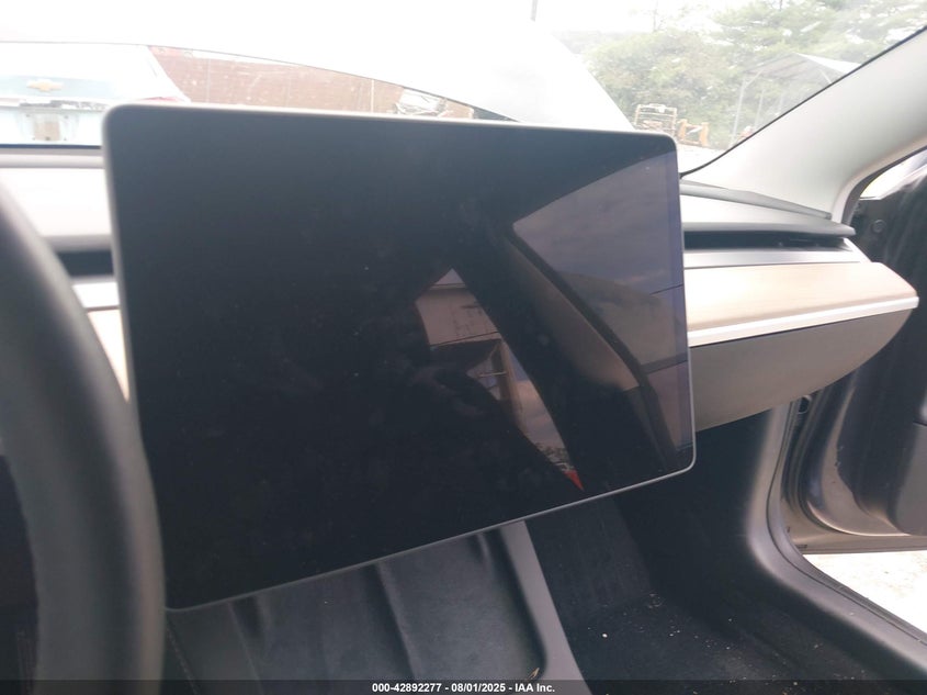 2023 Tesla Model 3 Long Range Dual Motor All-Wheel Drive VIN: 5YJ3E1EB3PF633554 Lot: 42892277