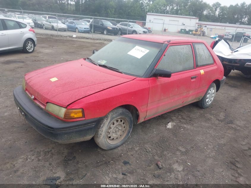 1994 Mazda 323 VIN: JM1BG2329R0803058 Lot: 42892840