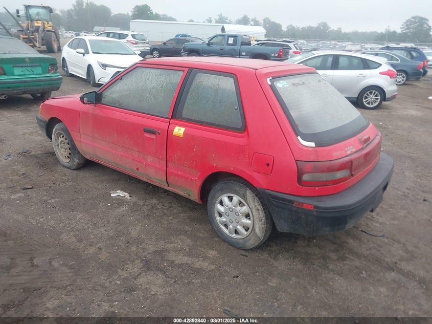 1994 Mazda 323 VIN: JM1BG2329R0803058 Lot: 42892840