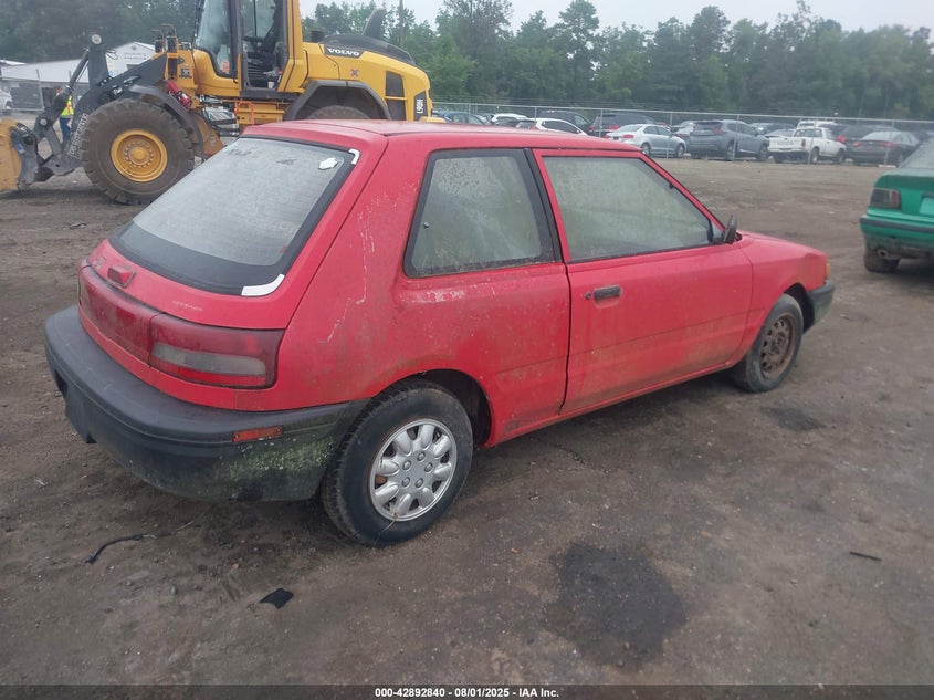 1994 Mazda 323 VIN: JM1BG2329R0803058 Lot: 42892840