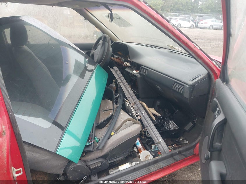 1994 Mazda 323 VIN: JM1BG2329R0803058 Lot: 42892840