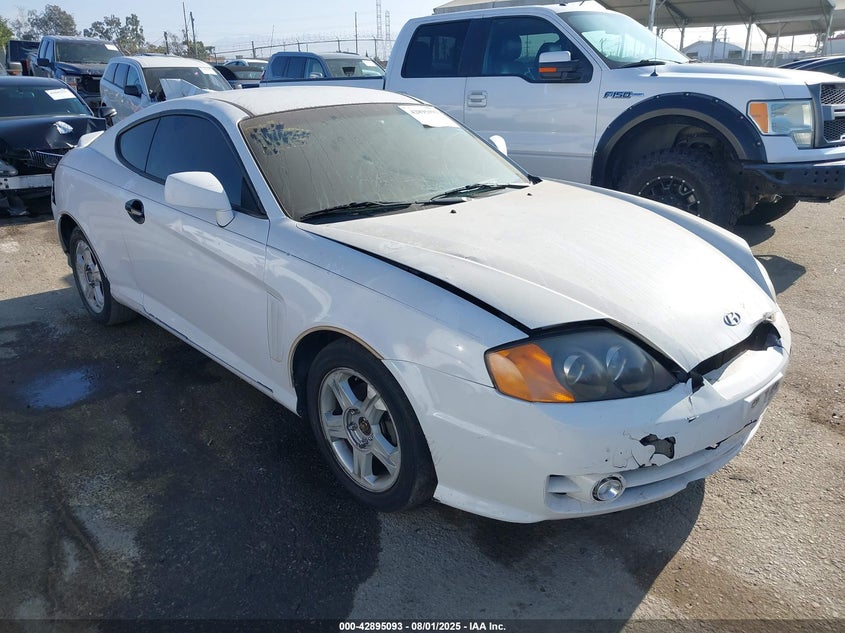 KMHHM65D64U107599 2004 Hyundai Tiburon auction photo 1