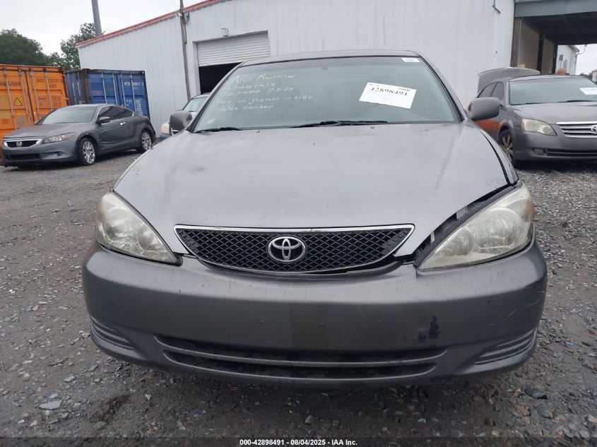 2003 Toyota Camry Le VIN: 4T1BE32K03U697561 Lot: 42898491