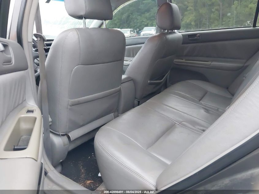 2003 Toyota Camry Le VIN: 4T1BE32K03U697561 Lot: 42898491