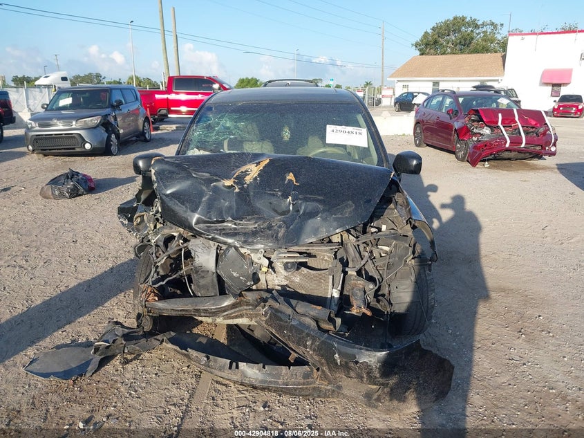 2009 Nissan Versa 1.8Sl VIN: 3N1BC13E79L411119 Lot: 42904818